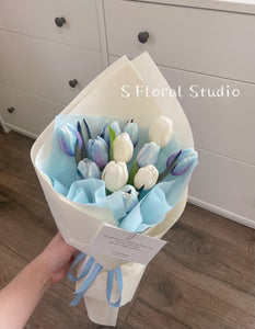 White and blue tulips bouquet