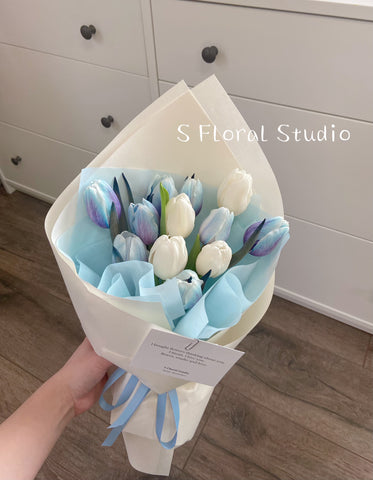 White and blue tulips bouquet