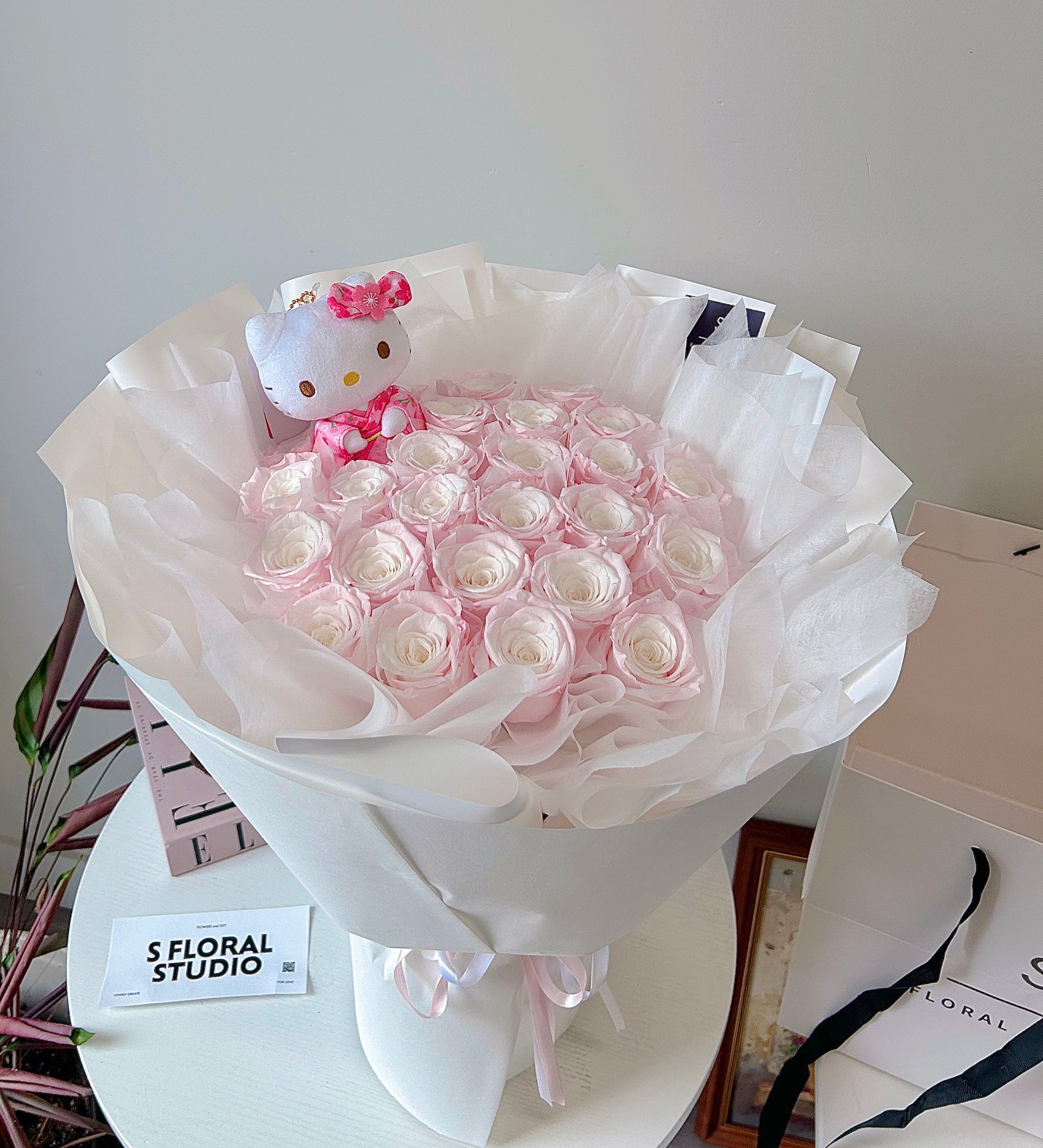Preserved pink roses bouquet with Hellokitty Doll