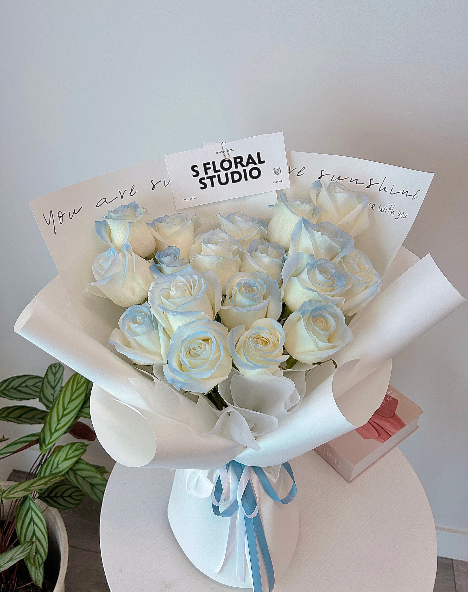 Tinted light blue roses bouquet 16