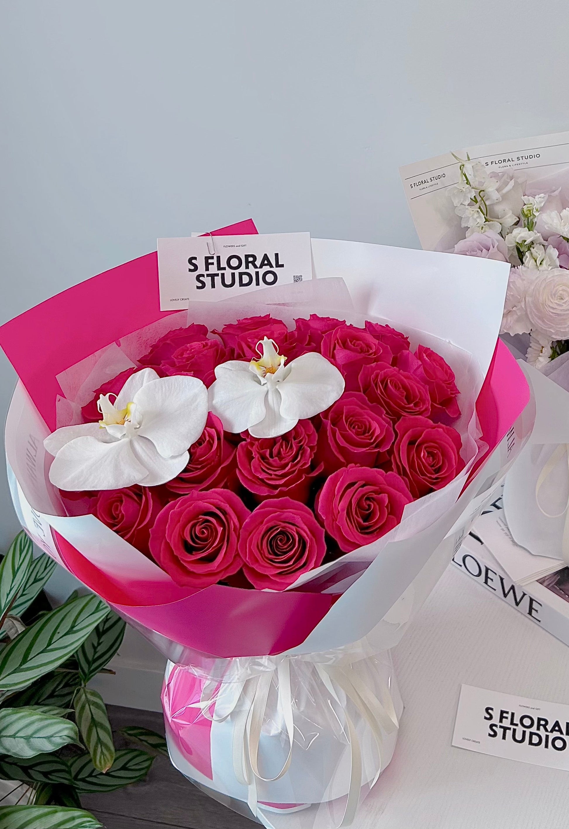 Hot pink roses with Phalaenopsis Bouquet