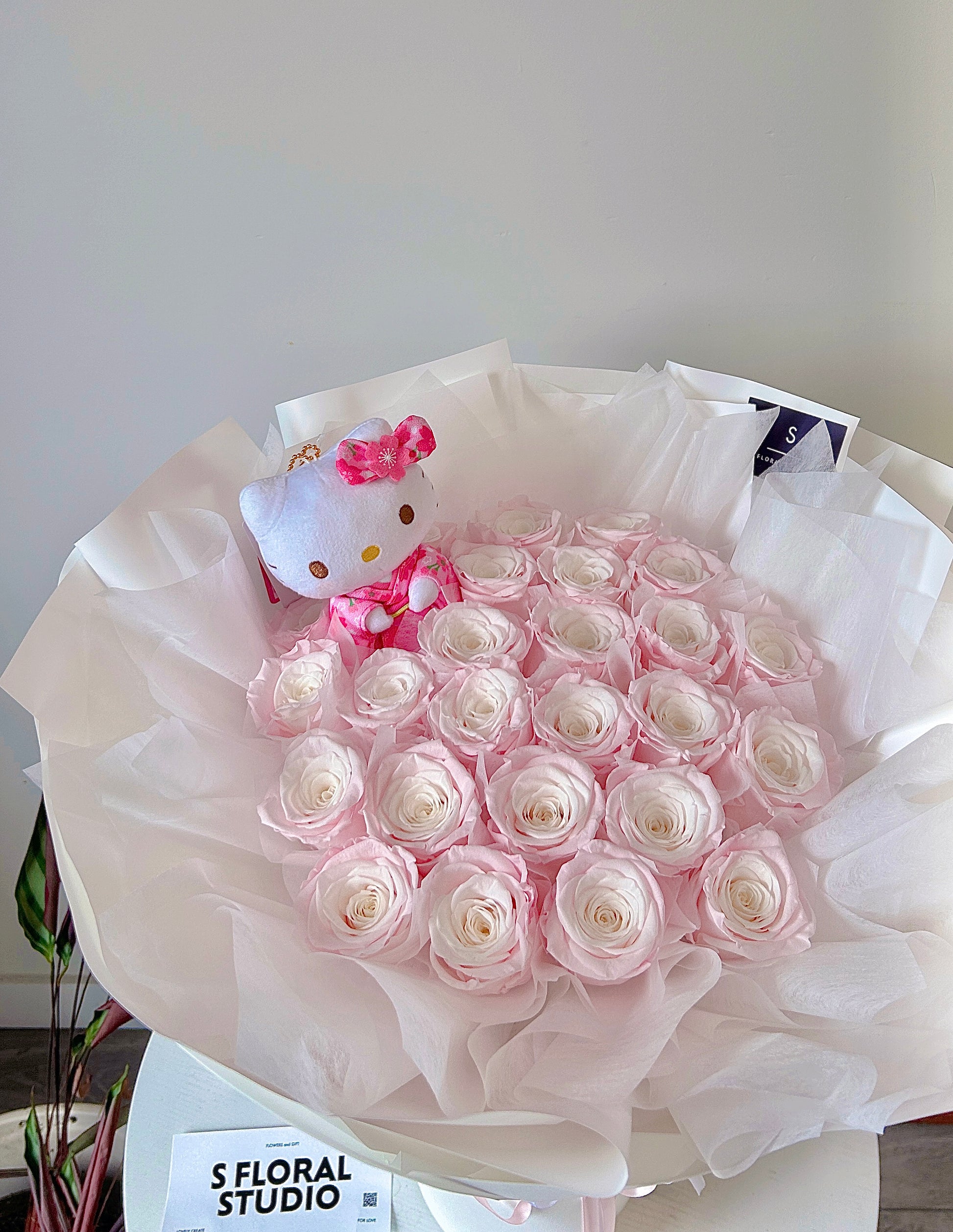 Preserved pink roses bouquet with Hellokitty Doll