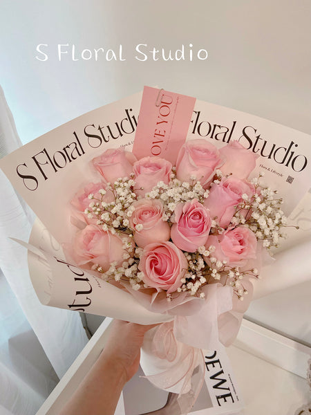 Light pink roses with Babybreath